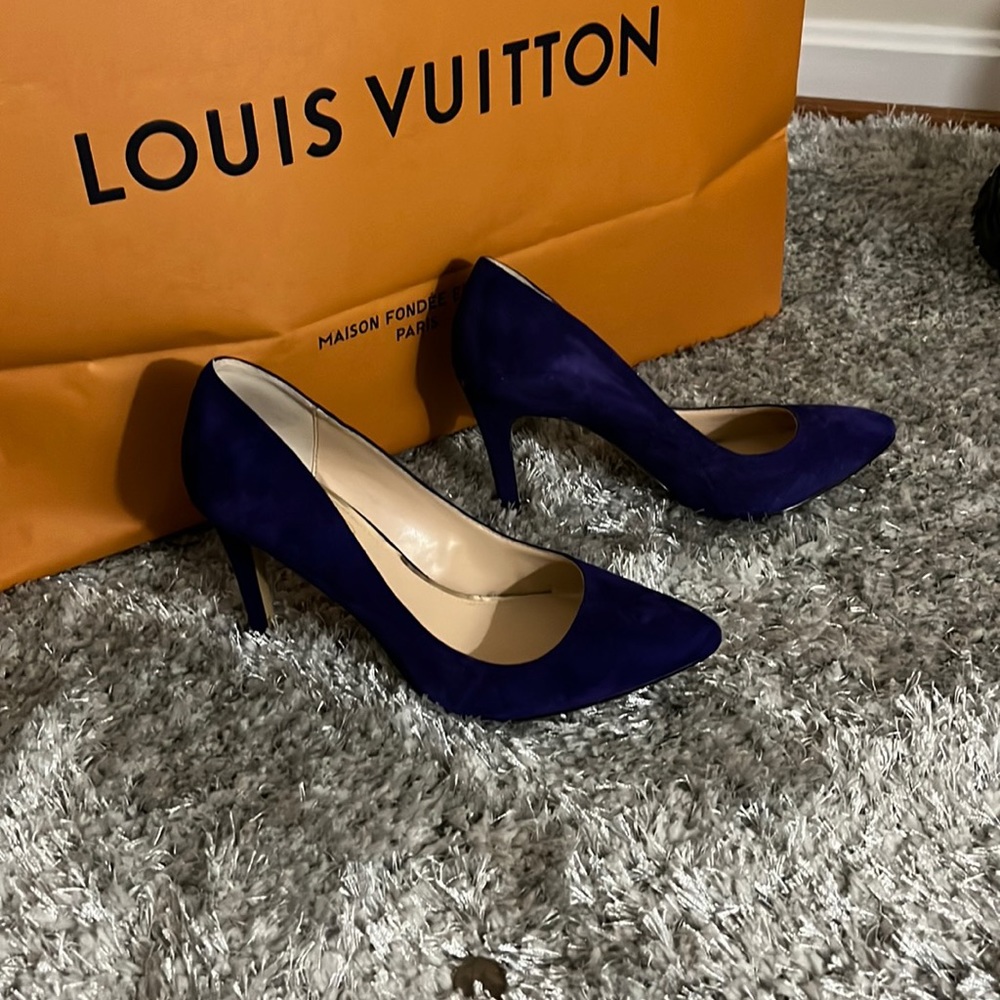 Purple suede pumps